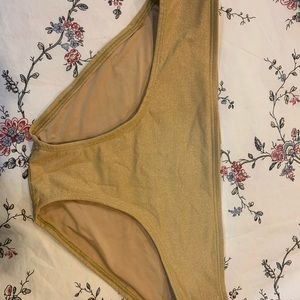 Bottom piece bathing suit. Sparkling gold.